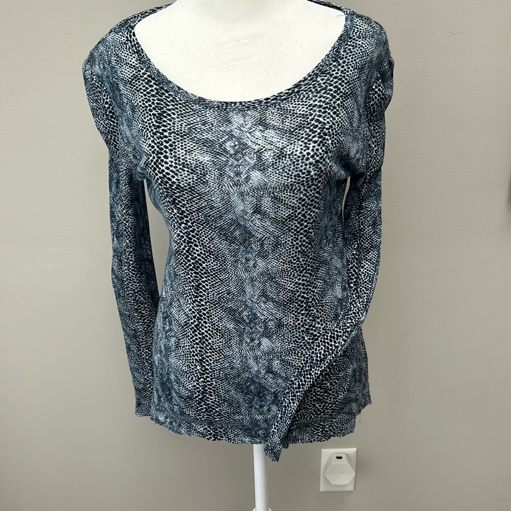 Tory Burch light weight snake skin patterned long sleeve top.